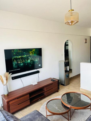 T’s one bedroom duplex haven in Kinoo